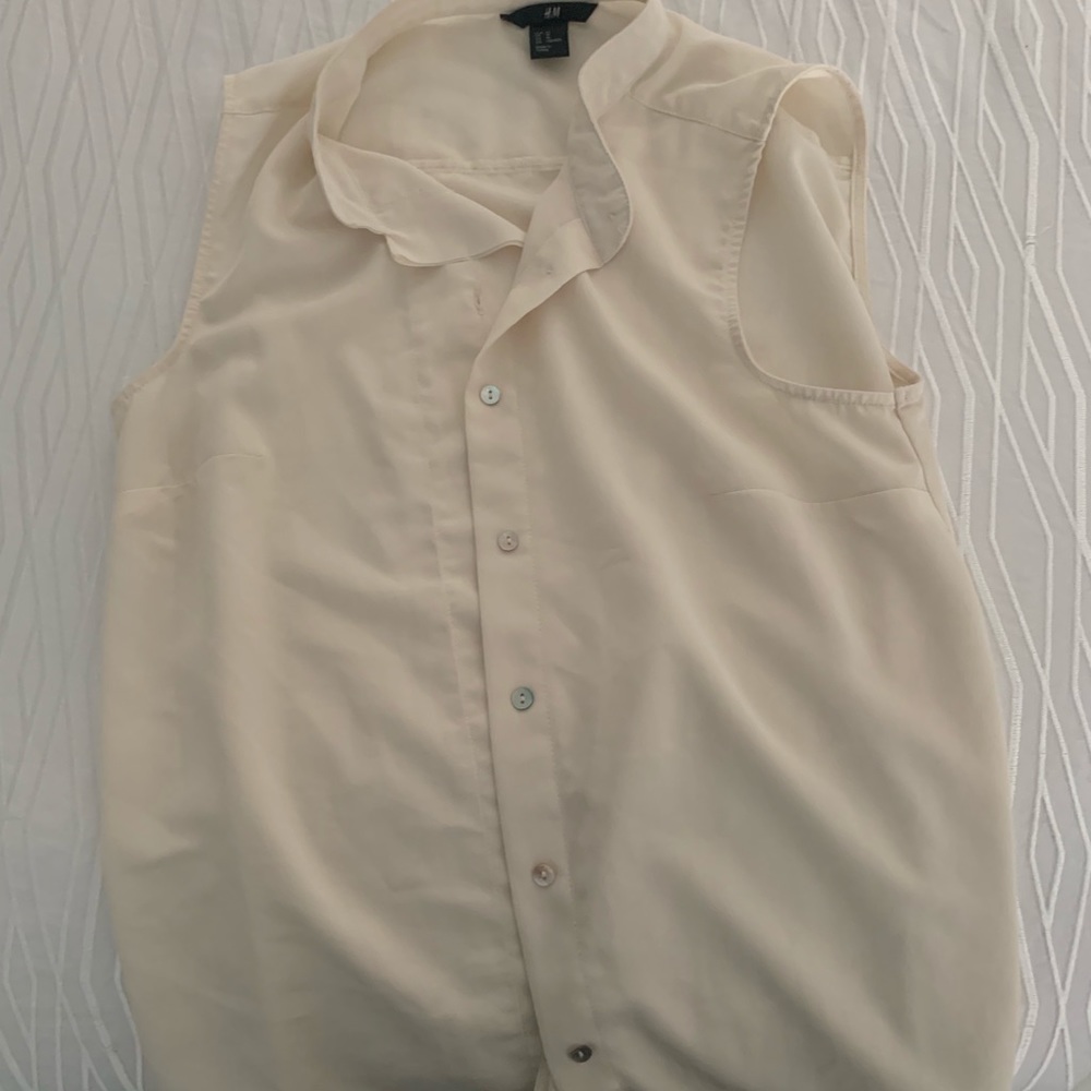 Off white sleeveless button down